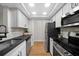 Modern kitchen features stainless steel appliances, ample counter space, and ample cabinet space at 3066 Chastain Park Ne Ct, Atlanta, GA 30342