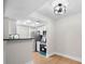 Well-lit modern kitchen with stainless steel appliances and breakfast bar, perfect for casual dining at 3066 Chastain Park Ne Ct, Atlanta, GA 30342