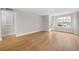 Large living room features durable wood floors and ample natural light, creating a bright and welcoming space at 3066 Chastain Park Ne Ct, Atlanta, GA 30342