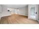 Spacious living room with wood floors and neutral walls, offering a versatile space for entertaining or relaxation at 3066 Chastain Park Ne Ct, Atlanta, GA 30342