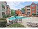 Community pool surrounded by lounge chairs, providing a perfect spot for relaxation and socializing at 3066 Chastain Park Ne Ct, Atlanta, GA 30342