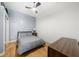 Bright bedroom with hardwood floors and ceiling fan at 800 Peachtree Ne St # 8607, Atlanta, GA 30308