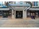 Modern building entrance with covered walkway at 800 Peachtree Ne St # 8607, Atlanta, GA 30308