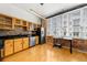Modern kitchen with light wood cabinets and stainless steel appliances at 800 Peachtree Ne St # 8607, Atlanta, GA 30308