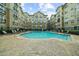 Inviting community pool with surrounding deck at 800 Peachtree Ne St # 8607, Atlanta, GA 30308