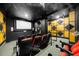 Community theater room with comfortable seating and a large projection screen at 800 Peachtree Ne St # 8607, Atlanta, GA 30308