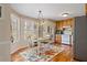 Kitchen features stainless steel appliances and hardwood floors at 304 Stations Ave, Woodstock, GA 30189