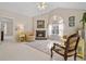 Spacious living room featuring a fireplace and large windows at 304 Stations Ave, Woodstock, GA 30189