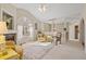 Bright living room with vaulted ceiling and cozy seating at 304 Stations Ave, Woodstock, GA 30189