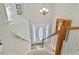 Elegant staircase leading to the upper level at 304 Stations Ave, Woodstock, GA 30189