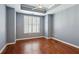 Light-filled bedroom with hardwood floors and ceiling fan at 325 E Paces Ferry Ne Rd # 1608, Atlanta, GA 30305