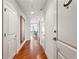 Bright hallway with hardwood floors and modern doors at 325 E Paces Ferry Ne Rd # 1608, Atlanta, GA 30305