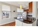 Modern kitchen with stainless steel appliances and granite countertops at 325 E Paces Ferry Ne Rd # 1608, Atlanta, GA 30305