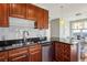 Modern kitchen with stainless steel appliances and granite countertops at 325 E Paces Ferry Ne Rd # 1608, Atlanta, GA 30305