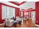 Red-walled sitting area featuring two armchairs and a coffee table at 325 E Paces Ferry Ne Rd # 1608, Atlanta, GA 30305