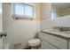 Clean bathroom with white tile, granite countertop, and updated vanity at 3854 Brookcrest Cir, Decatur, GA 30032