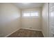 Simple bedroom with carpet flooring and window at 3854 Brookcrest Cir, Decatur, GA 30032