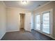 Spacious bedroom with French doors and carpet flooring at 3854 Brookcrest Cir, Decatur, GA 30032