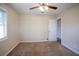 Spacious bedroom with window and carpet flooring at 3854 Brookcrest Cir, Decatur, GA 30032