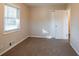 Spacious bedroom with neutral walls, carpet, and a large closet at 3854 Brookcrest Cir, Decatur, GA 30032