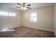 Bright bedroom with ceiling fan and carpet at 3854 Brookcrest Cir, Decatur, GA 30032