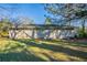 Rear view of the house showcasing its brick exterior and yard at 3854 Brookcrest Cir, Decatur, GA 30032