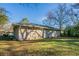 Another rear view of the house showcasing its brick exterior and yard at 3854 Brookcrest Cir, Decatur, GA 30032