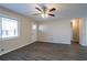 Living room featuring hardwood floors, a ceiling fan, and lots of natural light at 3854 Brookcrest Cir, Decatur, GA 30032