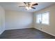 Spacious living room with hardwood floors and ceiling fan at 3854 Brookcrest Cir, Decatur, GA 30032