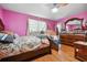 Bedroom with double bed and wood dresser at 434 Cana Of Galilee Ct, Tucker, GA 30084