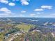 Aerial view of homes and community, showcasing surrounding landscape at 6034 Regent Mnr, Lithonia, GA 30058