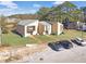 Aerial view of townhouses and parking lot at 6034 Regent Mnr, Lithonia, GA 30058