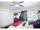 Bright bedroom with a queen bed and double closets at 6034 Regent Mnr, Lithonia, GA 30058