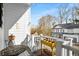 Balcony with outdoor seating and railings offering a view of the lush surrounding neighborhood at 1399 Knob Hill Se Ct, Atlanta, GA 30316