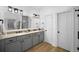 Modern bathroom with double vanity and large walk-in shower at 1399 Knob Hill Se Ct, Atlanta, GA 30316