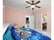 Cozy bedroom with carpet floors and a ceiling fan at 1399 Knob Hill Se Ct, Atlanta, GA 30316