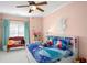 Cozy bedroom with carpet floors and a ceiling fan at 1399 Knob Hill Se Ct, Atlanta, GA 30316