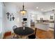 Cozy breakfast nook with a round table and chairs, adjacent to the kitchen at 1399 Knob Hill Se Ct, Atlanta, GA 30316