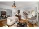 Open living room with a view into the dining room and hardwood floors at 1399 Knob Hill Se Ct, Atlanta, GA 30316