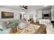 Spacious living room with a sectional sofa, bar area, and hardwood floors at 1399 Knob Hill Se Ct, Atlanta, GA 30316