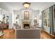Cozy living room featuring a fireplace, hardwood floors, and neutral decor for a warm ambiance at 1399 Knob Hill Se Ct, Atlanta, GA 30316