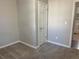 Bright bedroom with neutral walls and carpet flooring at 3690 Darrah Sw Way, Atlanta, GA 30331