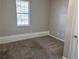 Spacious bedroom with neutral walls and carpet flooring at 3690 Darrah Sw Way, Atlanta, GA 30331