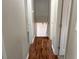 Clean and bright hallway with dark brown vinyl flooring at 3690 Darrah Sw Way, Atlanta, GA 30331