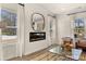 Living room fireplace with modern design and large mirror at 209 Bastian Dr # 4, Villa Rica, GA 30180