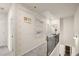 Upstairs hallway with 9ft ceilings and neutral carpet at 209 Bastain Dr # 4, Villa Rica, GA 30180