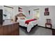 Charming bedroom with wood floors and large window at 1327 Hosea L Williams Se Dr, Atlanta, GA 30317