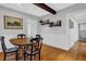 Charming dining room with hardwood floors and a round table at 1327 Hosea L Williams Se Dr, Atlanta, GA 30317