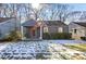 Cute gray bungalow with a covered porch and manicured lawn at 1327 Hosea L Williams Se Dr, Atlanta, GA 30317