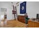 Cozy home office featuring built-in loft and wood floors at 1327 Hosea L Williams Se Dr, Atlanta, GA 30317